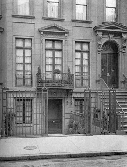 THE FORECOURT AND ENTRANCE OF THE FIFTY-FIFTH STREET HOUSE