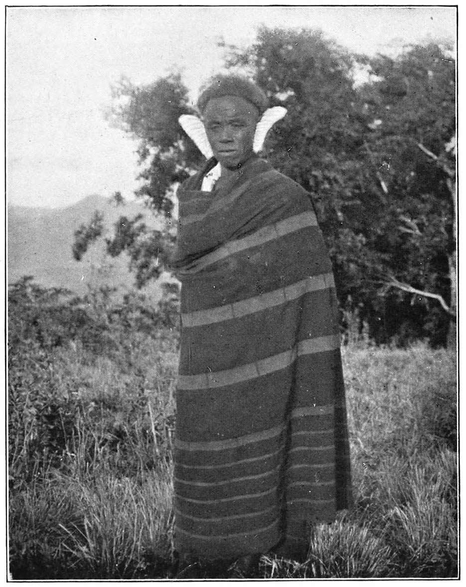 An elderly man of Lungitang wearing Lungpensü and big ear-pads